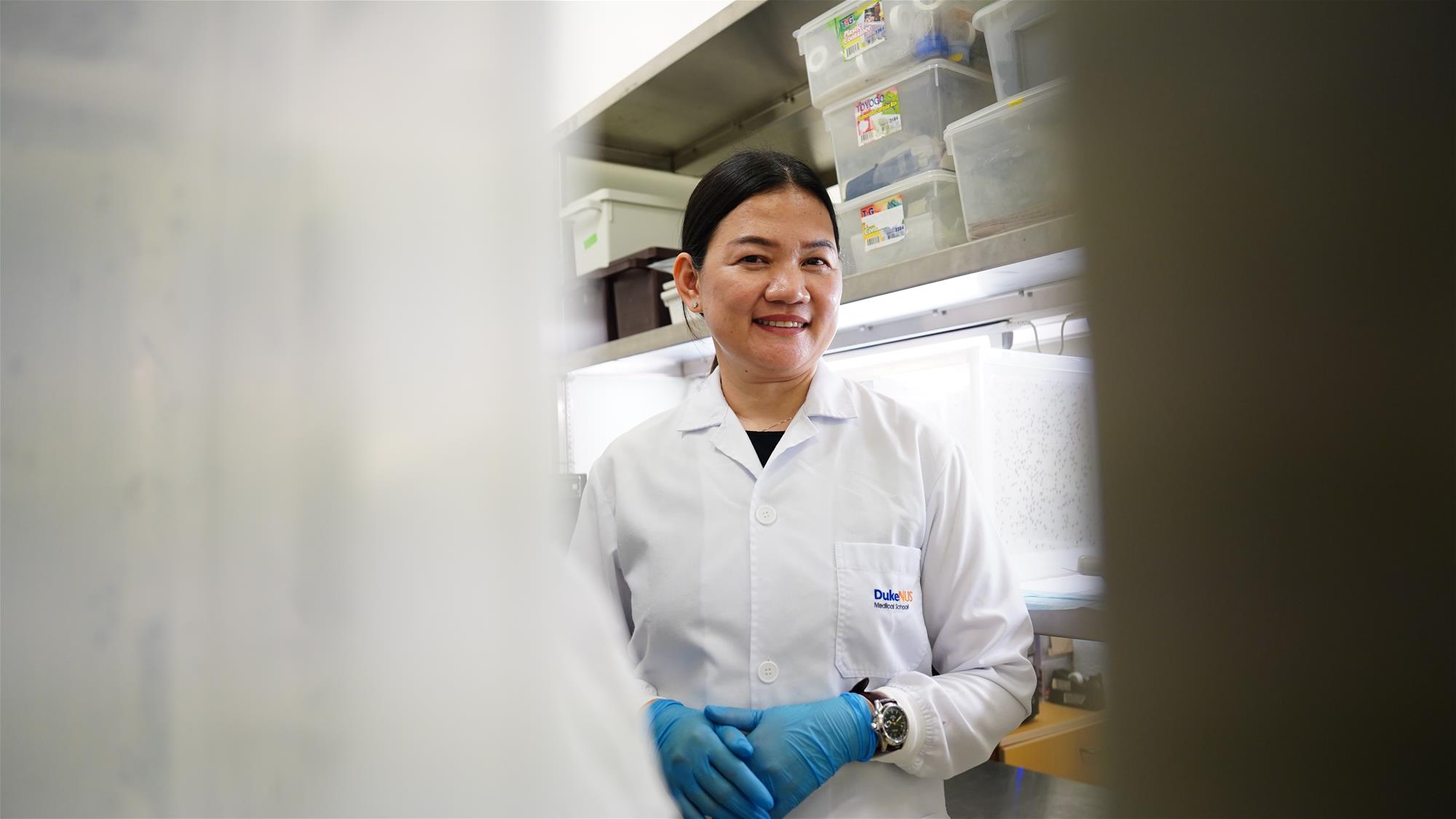 Manuel in the breeding section of the mosquito insectary where she works. // Credit: Norfaezah Abdullah, Duke-NUS