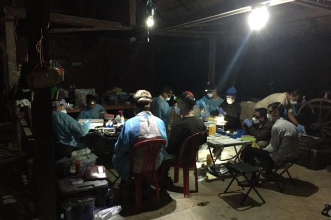 Scientists work late into the night to complete the sampling 