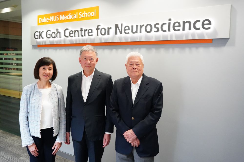 Standing in front of the signage to the GK Goh Centre for Neuroscience are (from left): Mrs and Mr Goh Yew Lin and Mr GK Goh