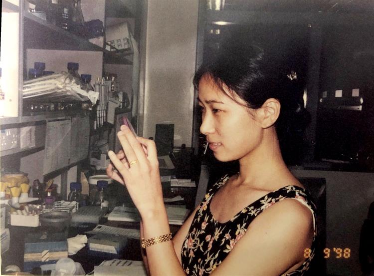 Wang in the lab in Singapore in 1998