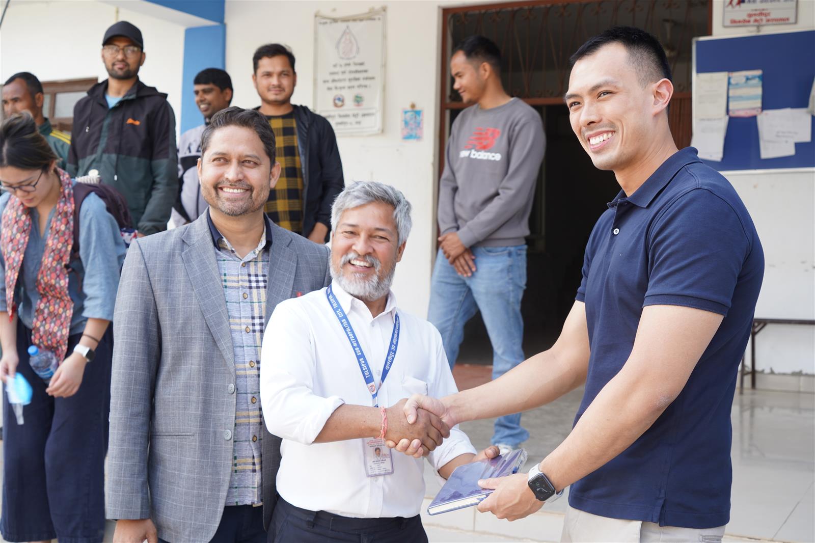 Charles Yau (right), with community leaders who facilitated Project DOVE’s collaborative work in Dang. // Credit: Project DOVE Nepal, Duke-NUS