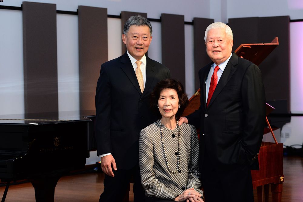 Mr Goh Yew Lin (left), his mother Mrs Madeline Goh, and his father, Mr GK Goh, at the Yong Siew Toh Conservatory of Music at the National University of Singapore where they endowered a professorship in 2019