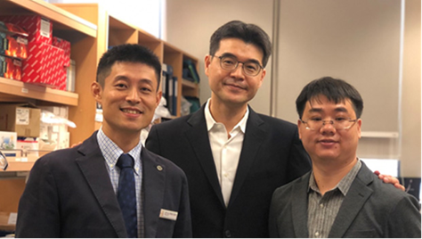 Three men posing in the lab, from left: Alfred Sun, Shawn Je and Qiang Yuan
