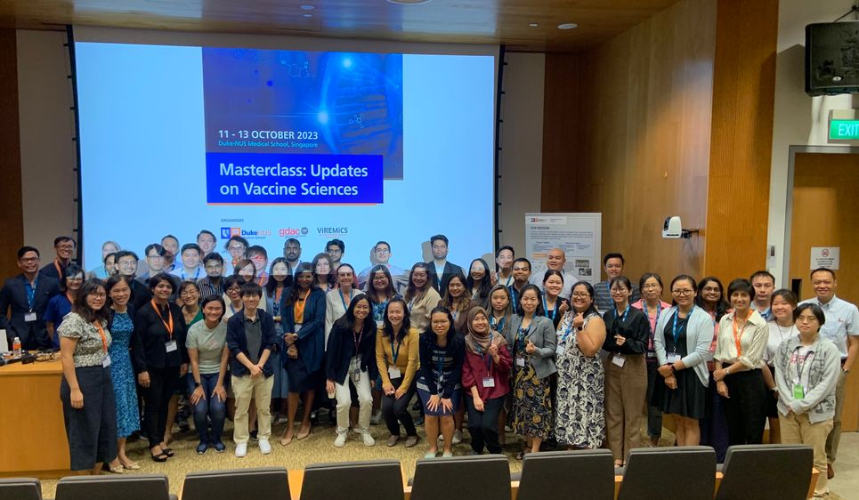 A group photo of presenters and attendees of a vaccinology masterclass held at Duke-NUS