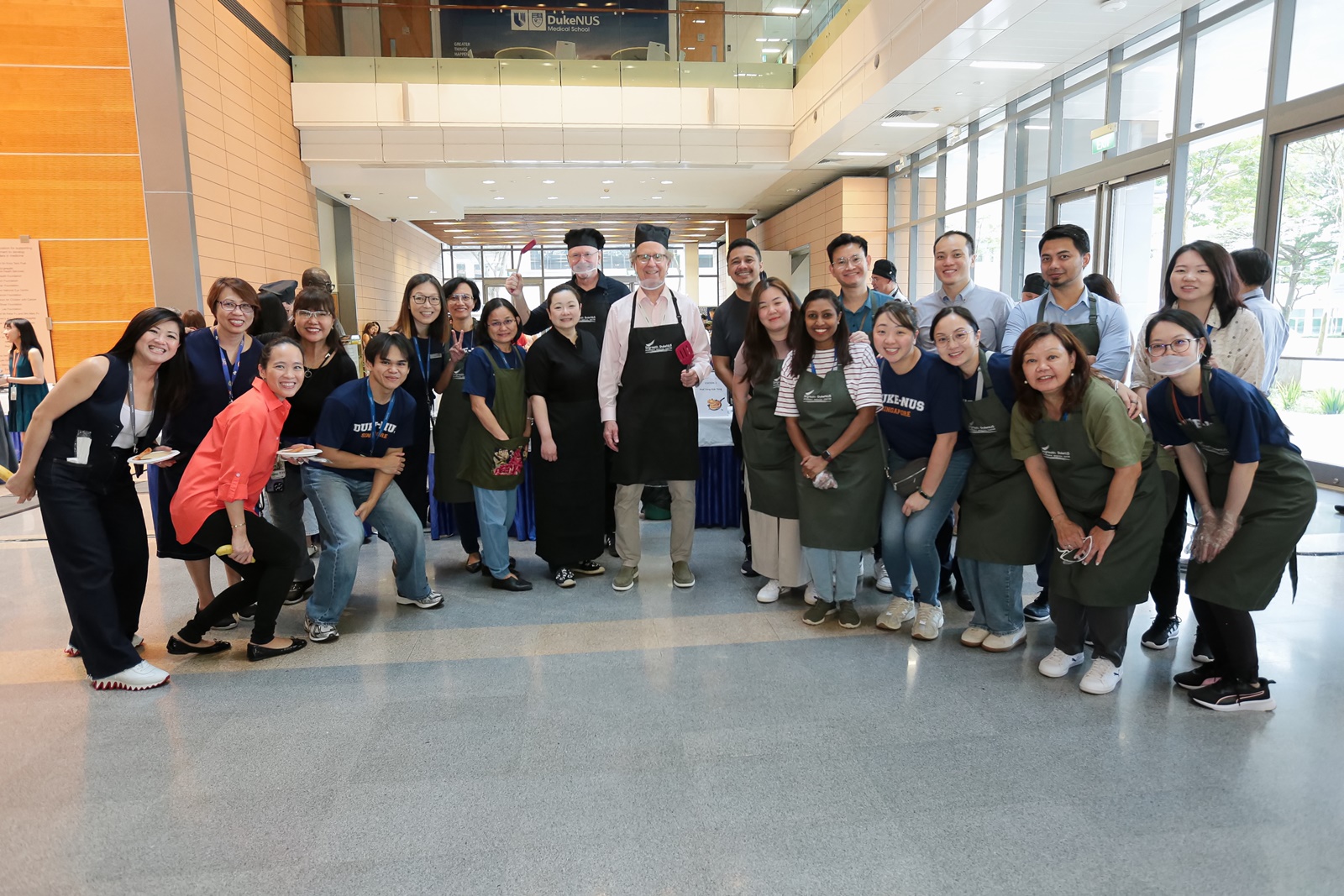 Dean Tom Coffman (middle) poses with the Office of Education and Dean’s Office, most of whom were eager enthusiasts behind the scrumptious event.