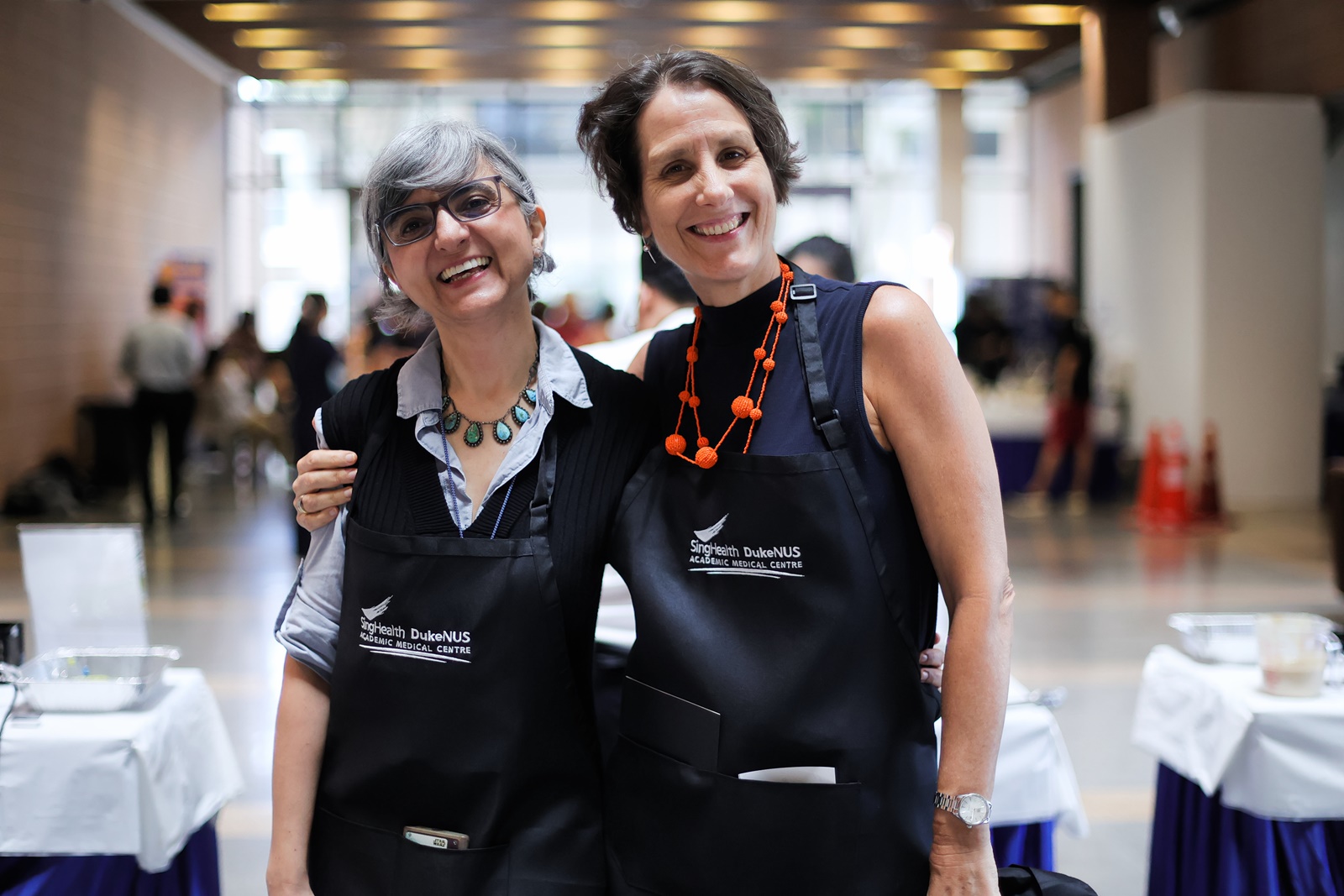 Vice-Dean of Education, Associate Professor Shiva Sarraf-Yazdi and Senior Associate Dean, Office of Education, Professor Silke Vogel share a moment before their pancake shift.