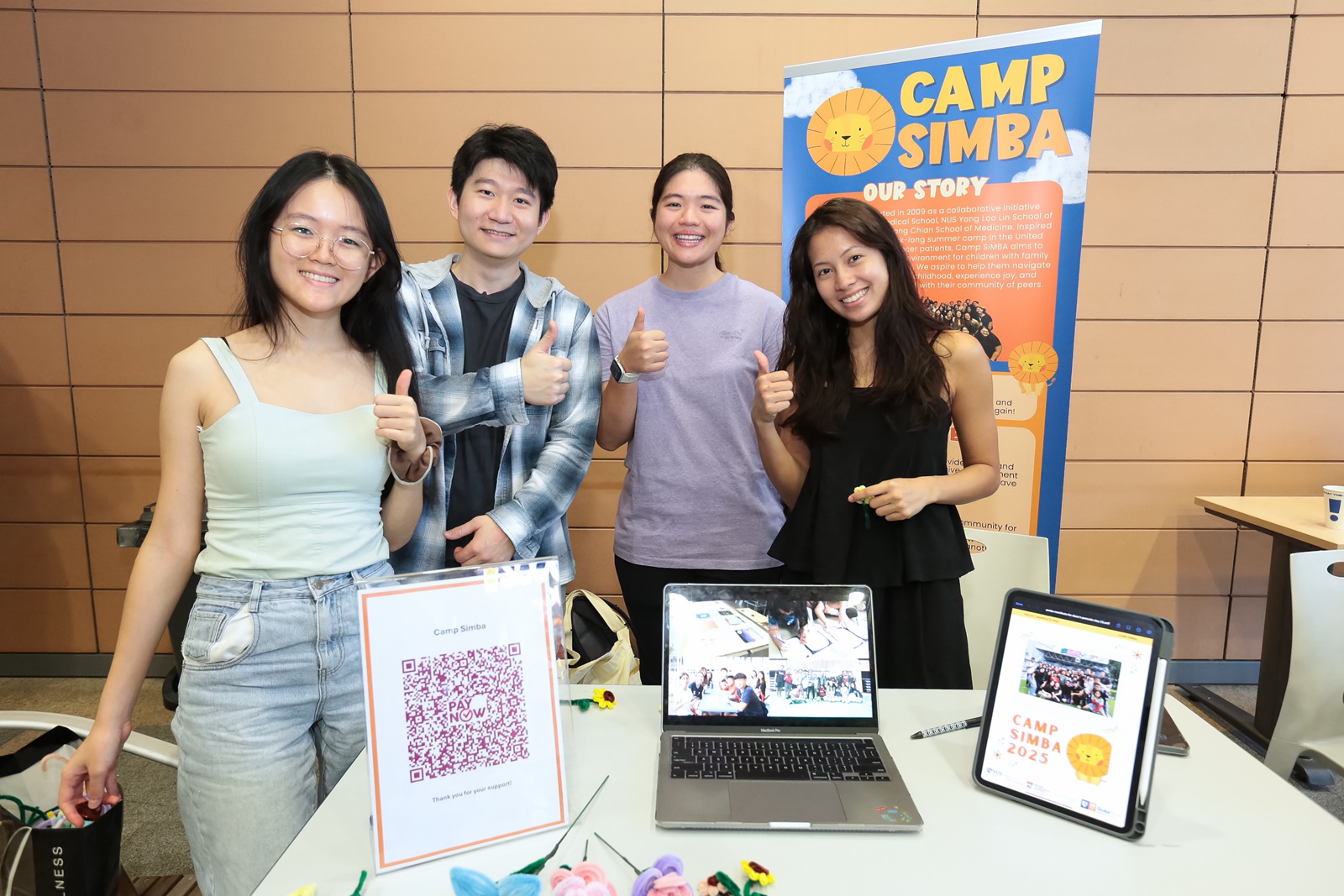 The jovial faces of Camp SIMBA raising funds and promoting their good work. The camp supports children whose family members have been diagnosed with cancer.