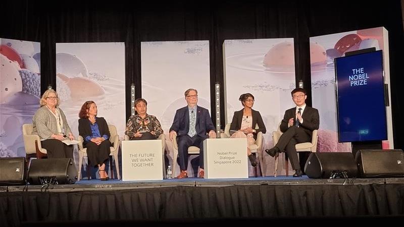 Left to right: Nobel laureate George Smoot (fourth from left) and Jacky Zhao (right most) during their panel Education and the future of youth
