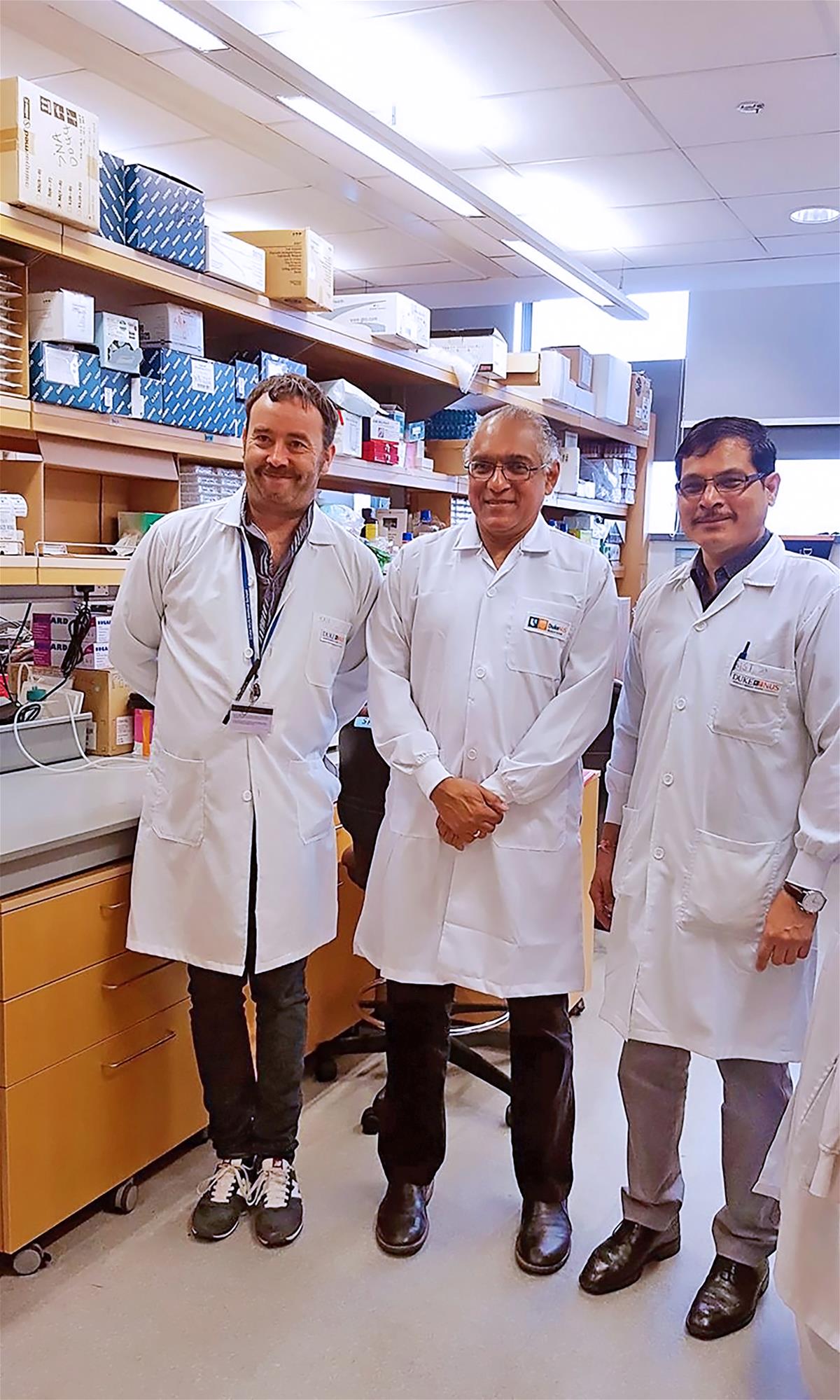 The research team, led by Professor Soman Abraham (centre), included co-first authors Andrea Mencarelli (left) and Pradeep Bist (right). // Credit: Courtesy of Soman Abraham